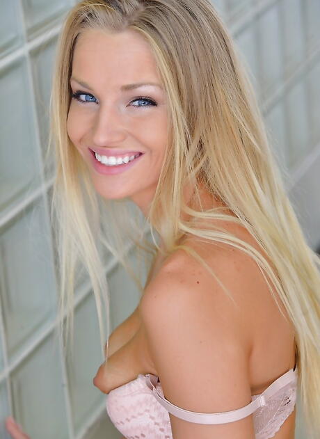 Rangy american blond teen Staci Carr in skirt exposing her butt and playing with dildo 